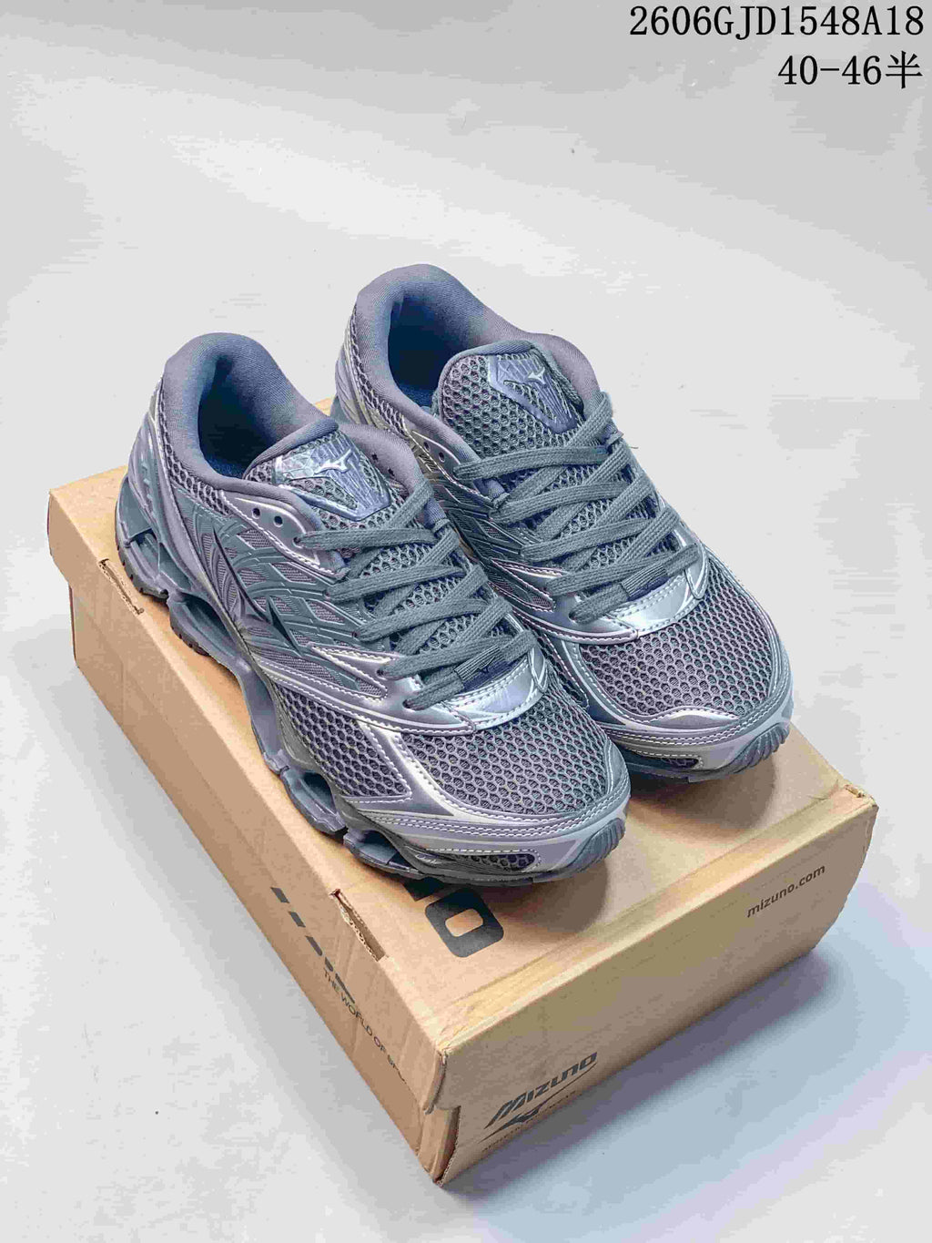 Pair of metallic gray Mizuno Prophecy 8 mesh running shoes shown from the front