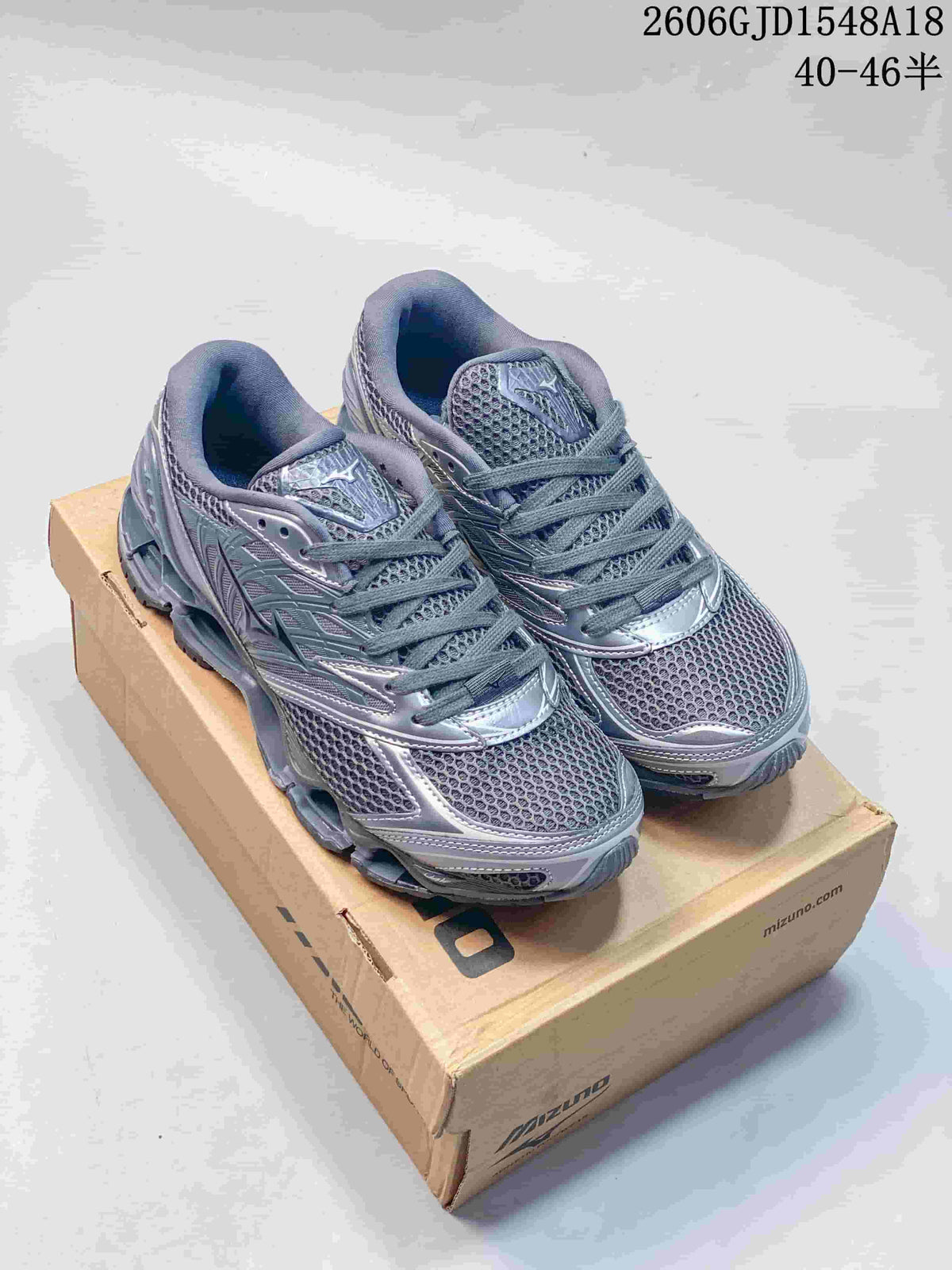 Pair of metallic gray Mizuno Prophecy 8 mesh running shoes shown from the front