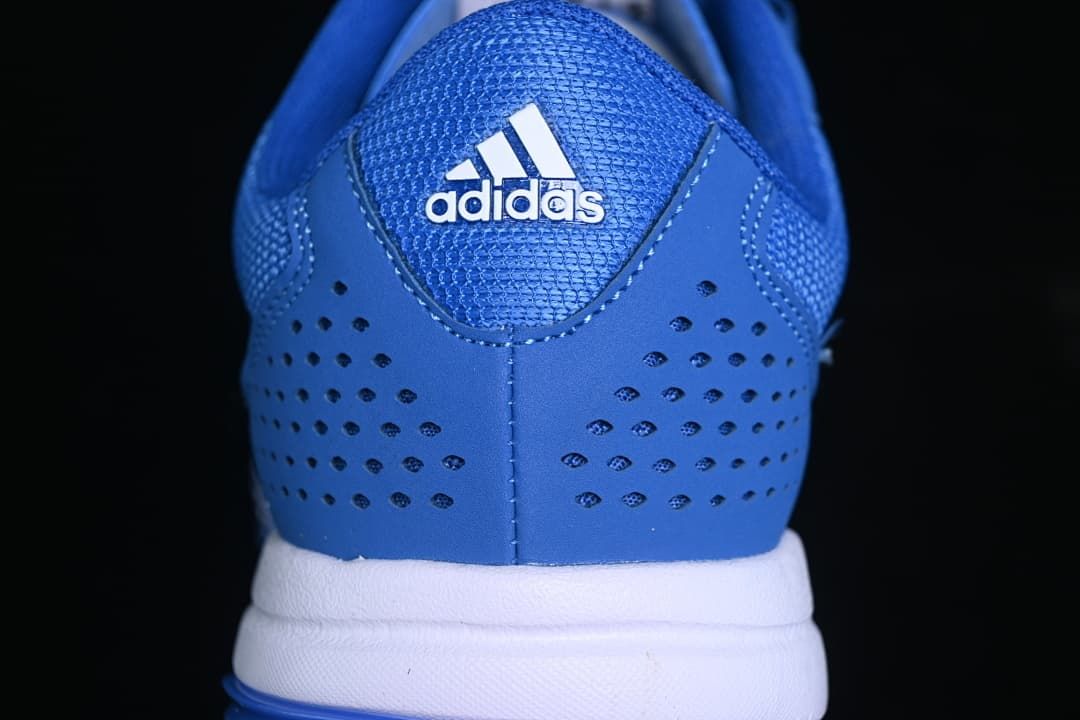 Rear view showing perforated heel panels and adidas branding
