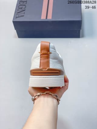 Rear view showing the tan heel detail and white sole.