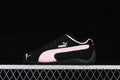 Side profile of a black Puma Speedcat OG sneaker with a pale pink Formstrip.