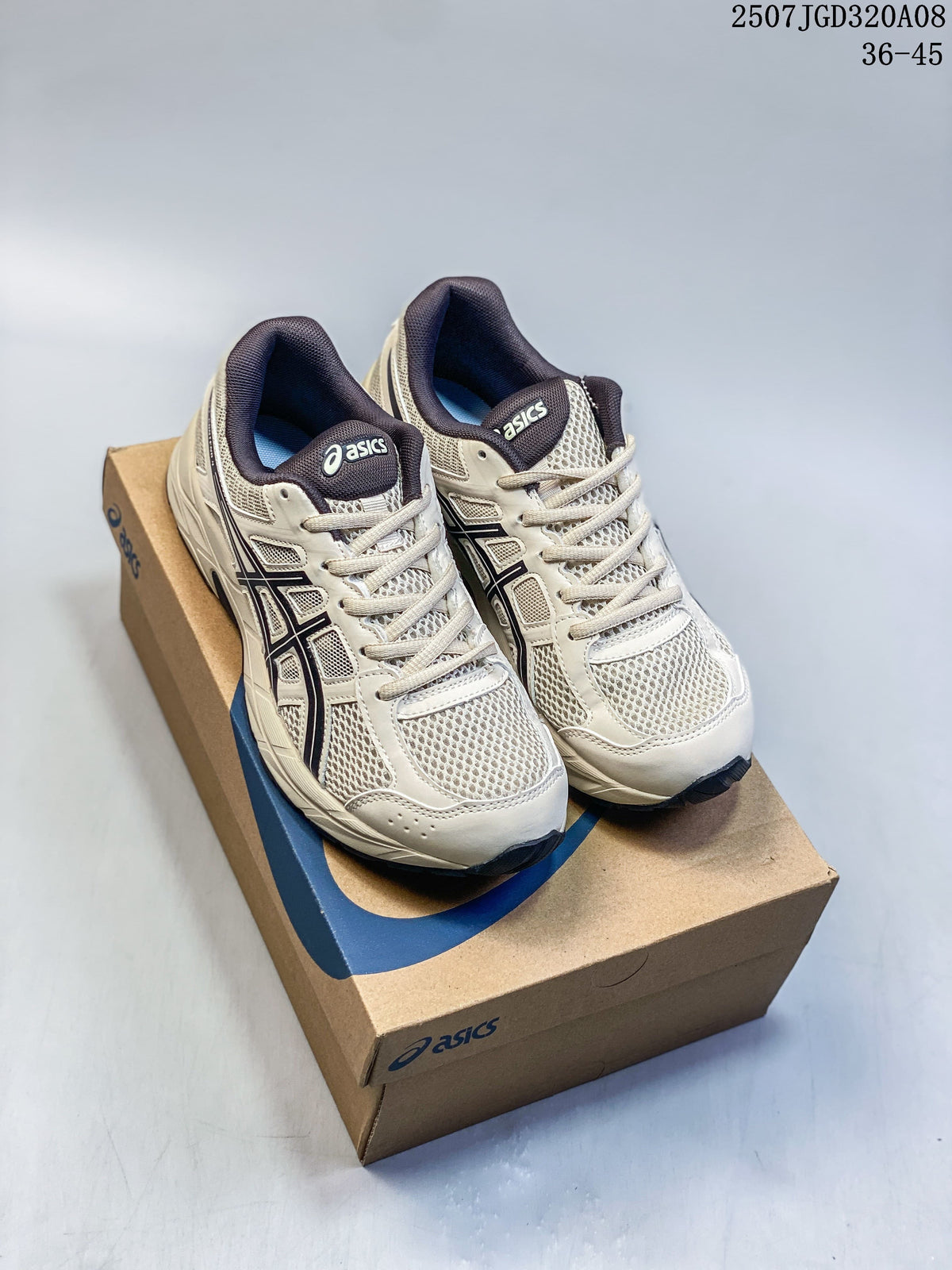 Pair of light gray ASICS Gel-Contend 4 sneakers with dark navy accents, shown on a shoebox.