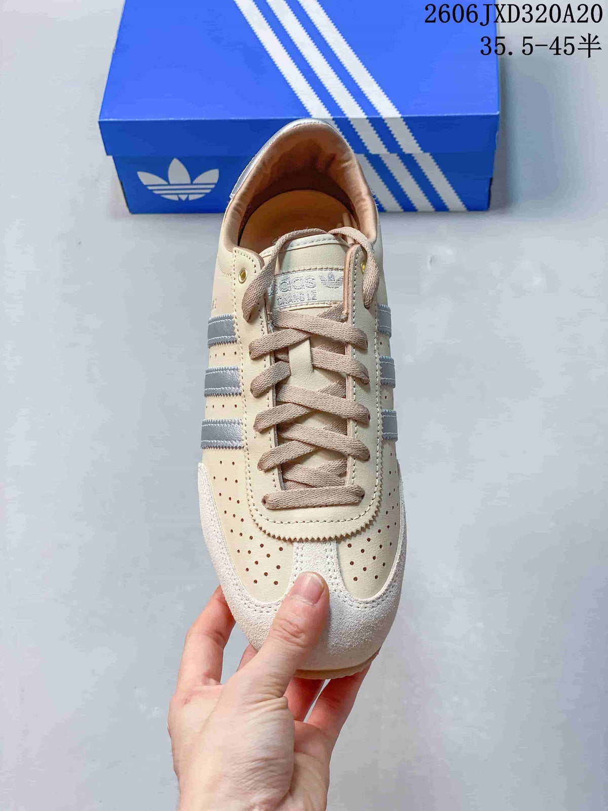 Top view of the sneaker showing its laces, perforated panels and textured toe overlays