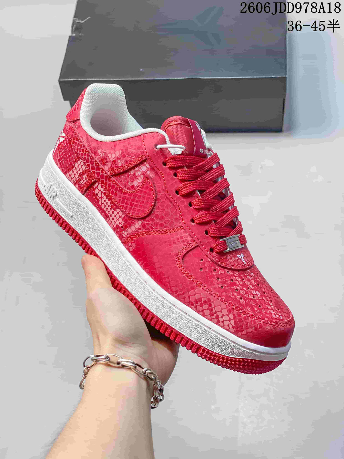 Close-up of the red patterned low-top sneaker with white midsole