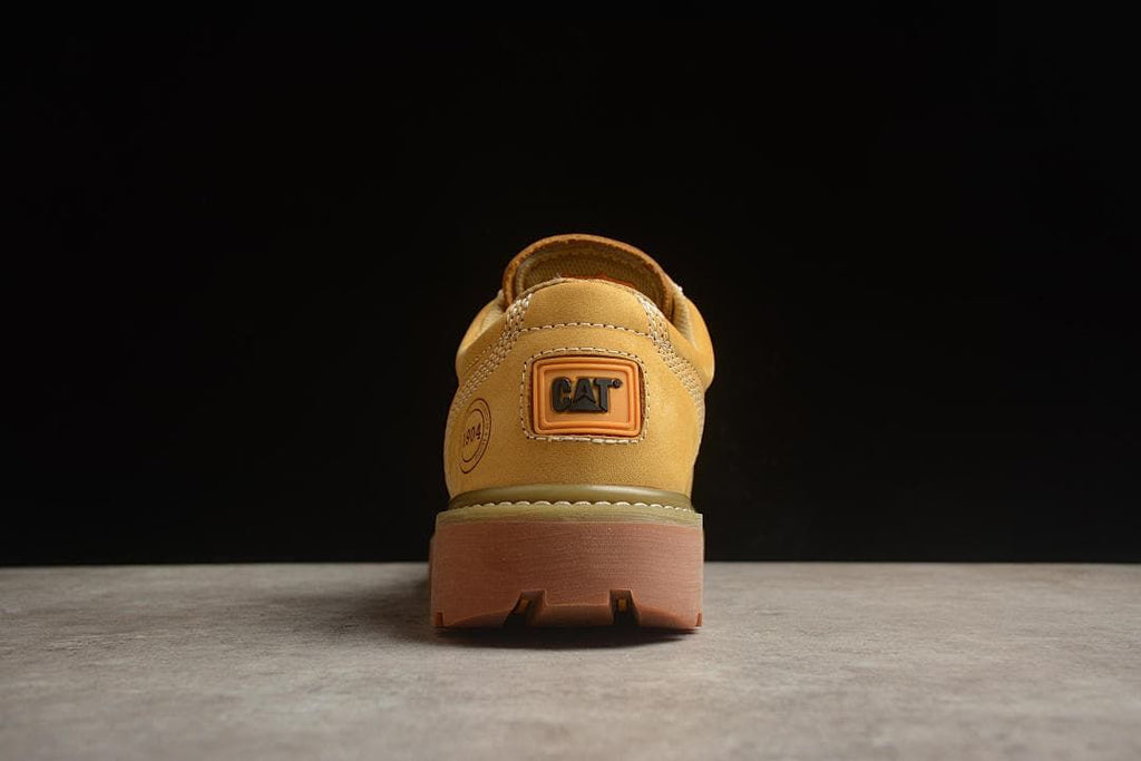 Rear view showing the CAT heel badge and brown outsole