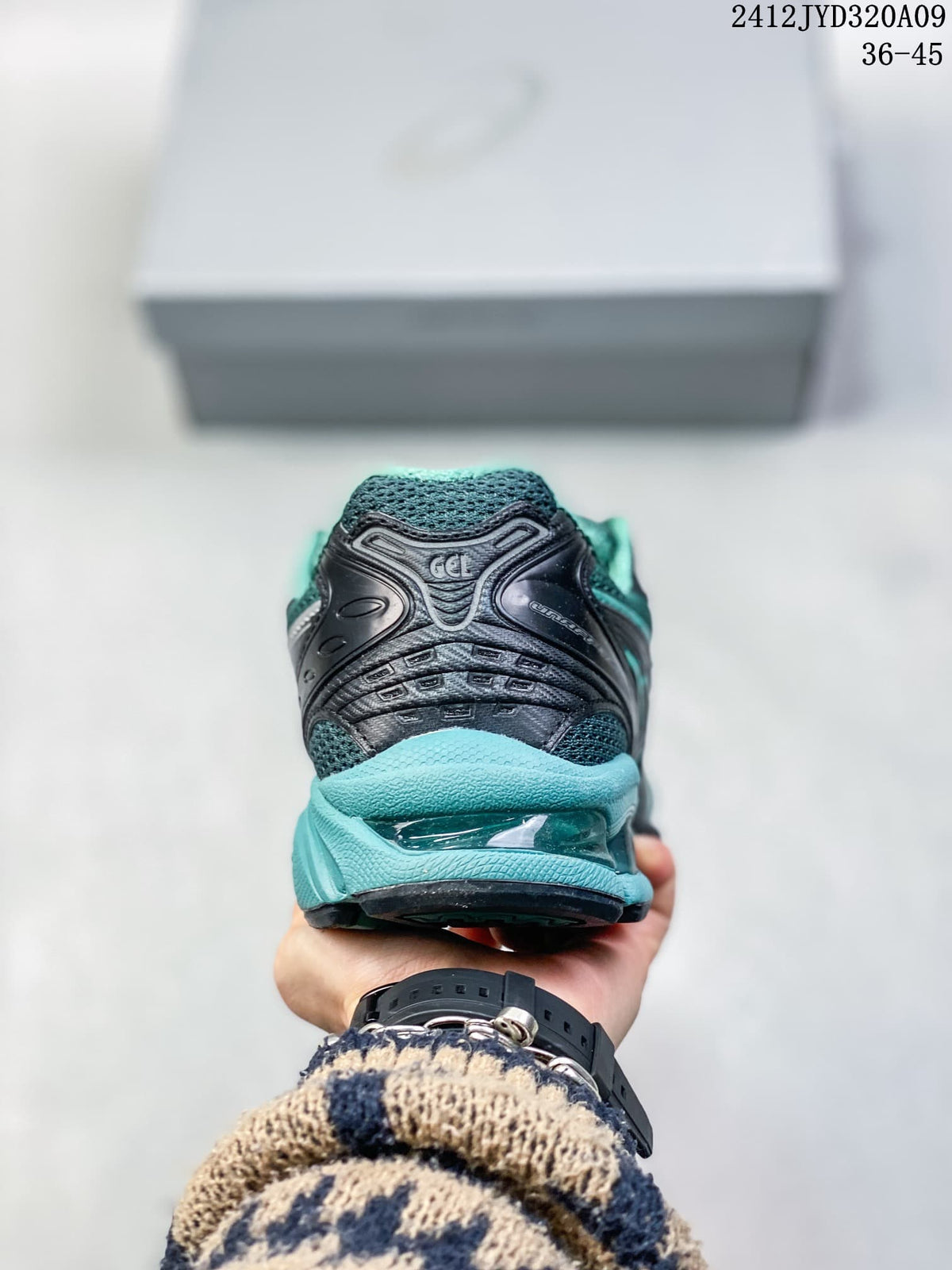Rear view of the teal and dark gray ASICS sneaker; image text shows 36–45 and 2412JYD320A09.