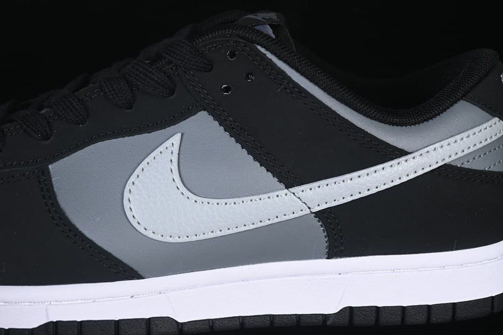 Close-up of the grey side panel and white Swoosh