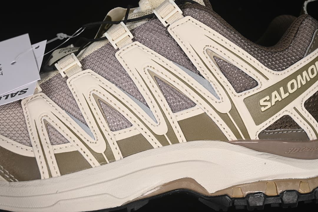 Close-up of the XA Pro 3D side panels, lace supports, and midsole.