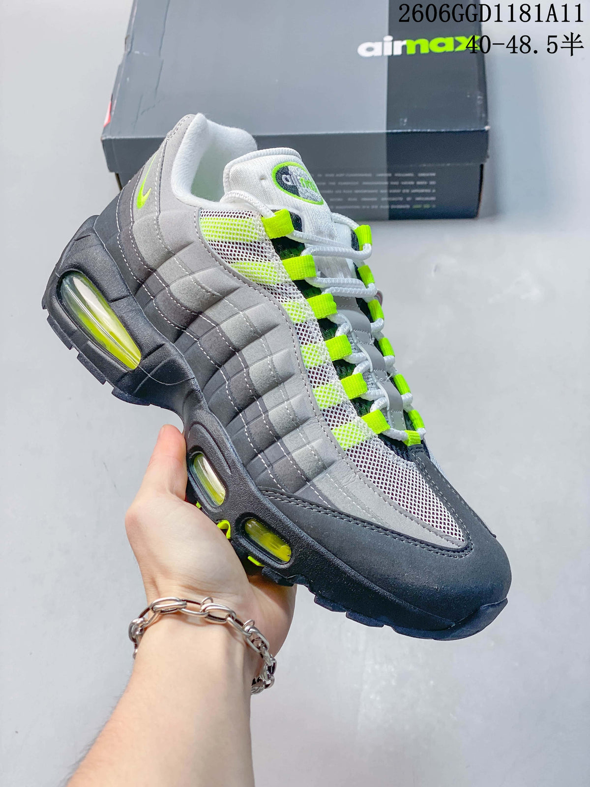 Angled side view highlighting the layered grey upper and visible Air units.