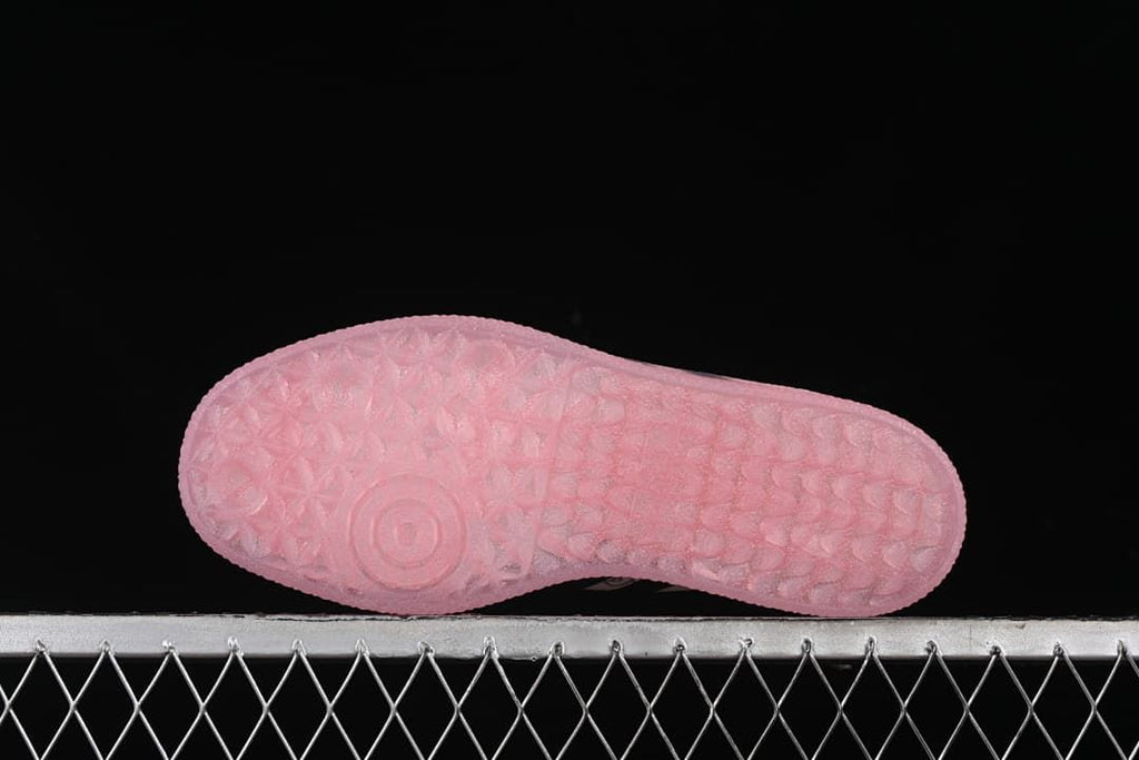 Underside view of the translucent pink outsole.