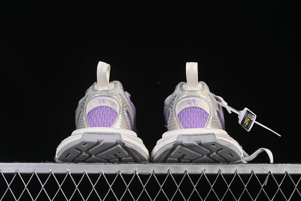 Rear view of both sneakers and their outsoles.