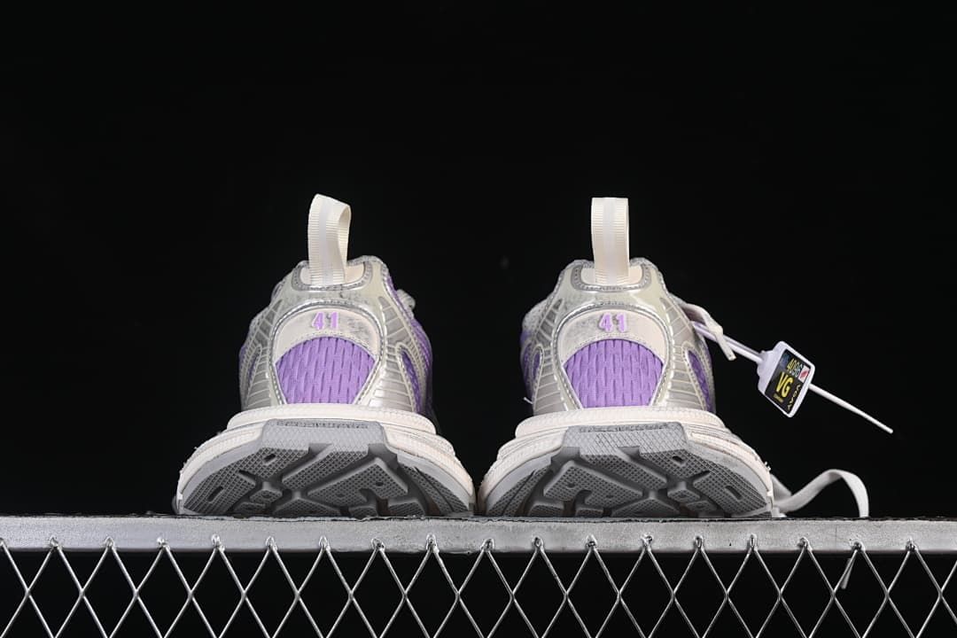 Rear view of both sneakers and their outsoles.