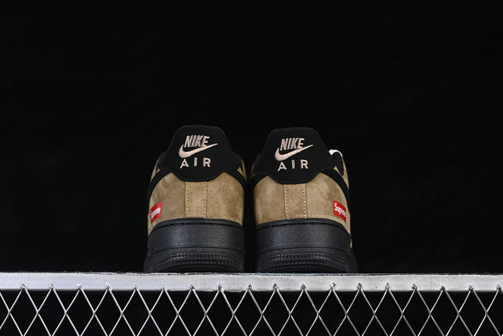 Rear view of the pair showing heel branding and black soles
