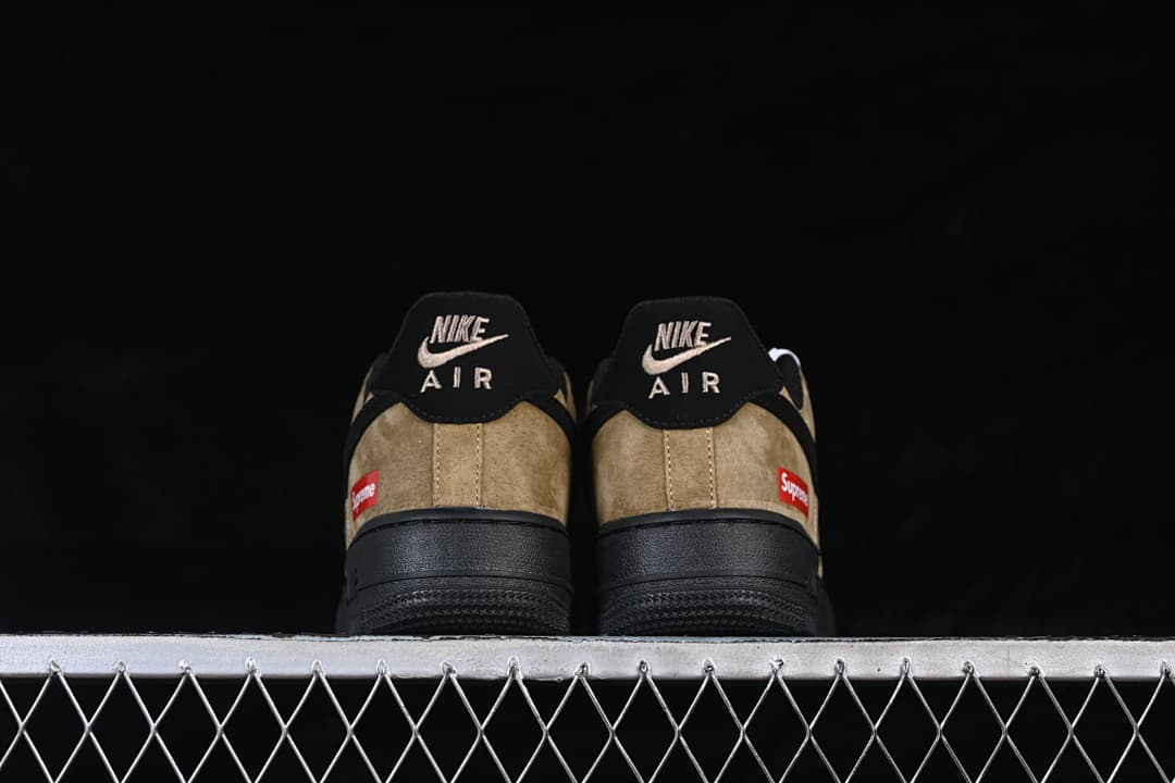 Rear view of the pair showing heel branding and black soles