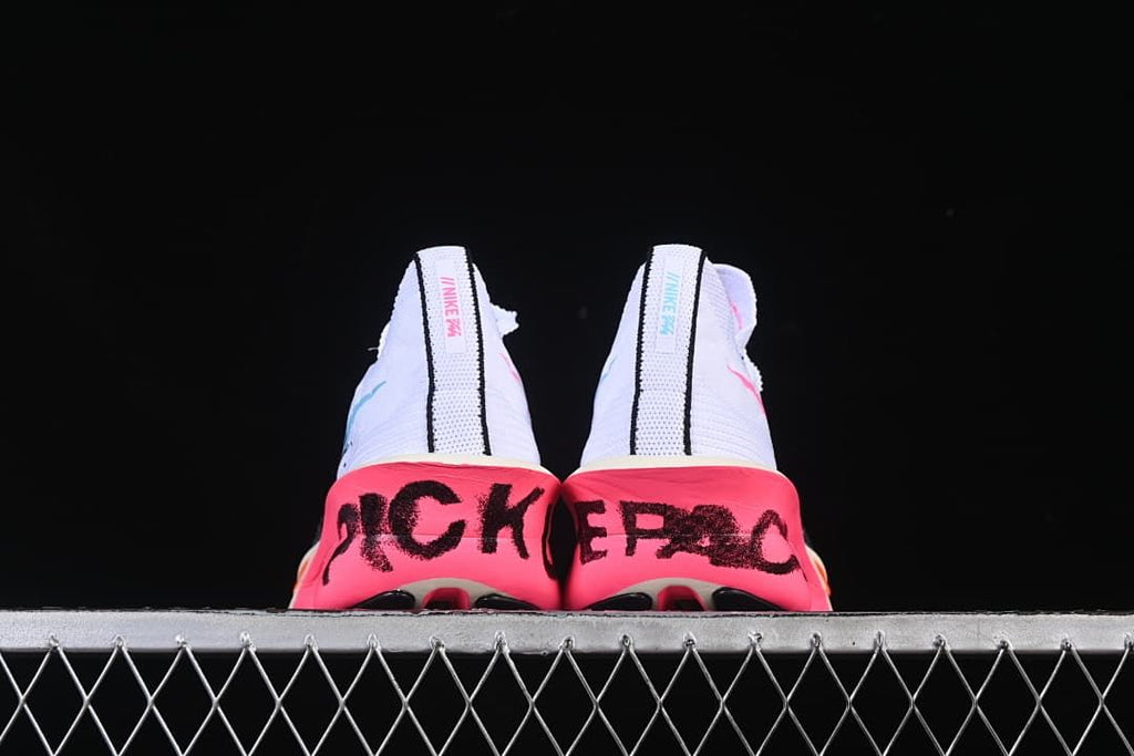 Rear view of the pair showing bright pink heel sections