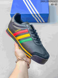 Dark gray Adidas Samoa low-top sneaker with red, yellow, and green side stripes