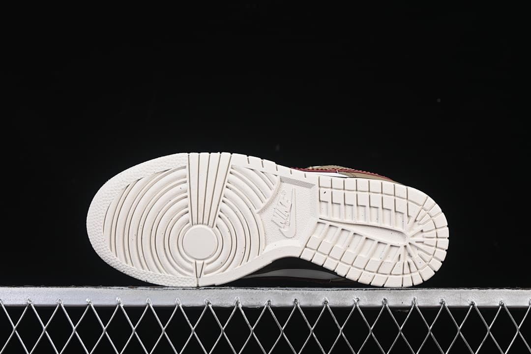 View of the white outsole with circular forefoot tread