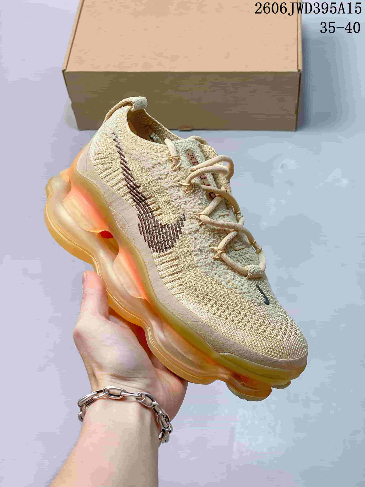 Light tan knit sneaker with a dark side mark and amber-toned sculpted sole; image also shows the text 35–40.