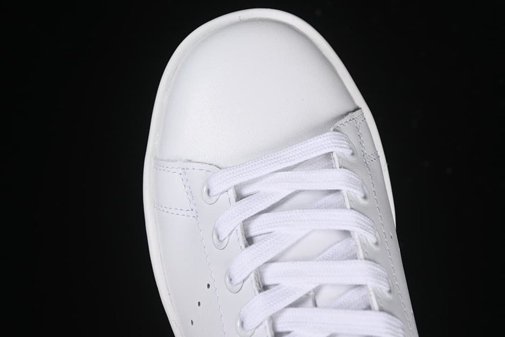 Top view of the rounded toe and white laces