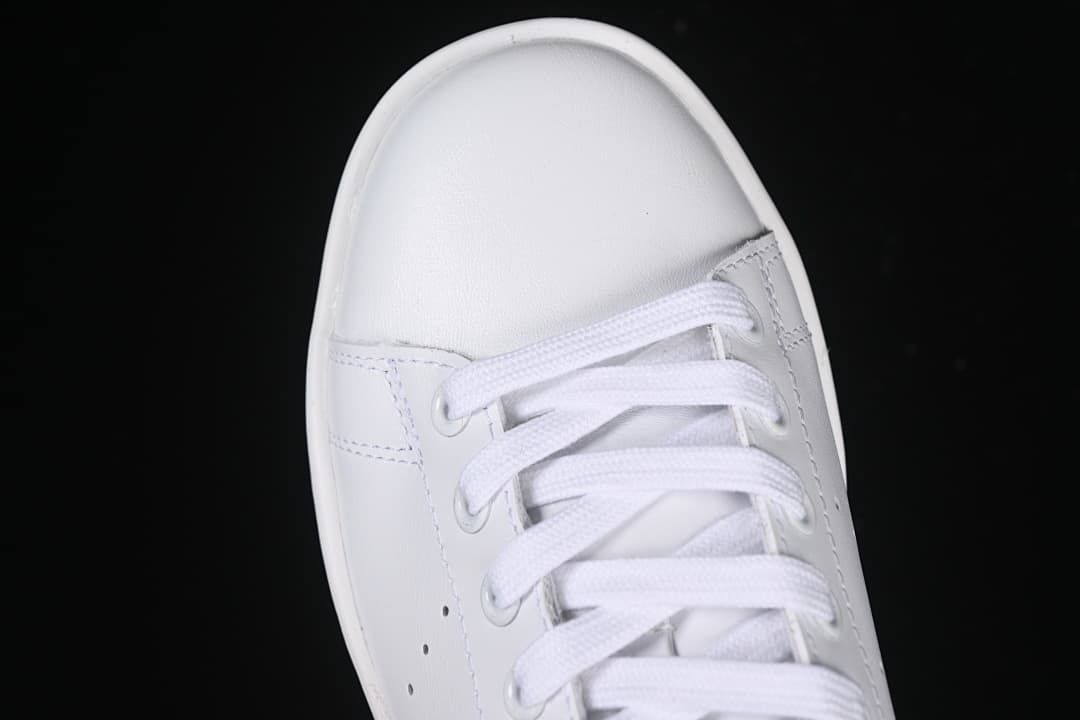 Top view of the rounded toe and white laces