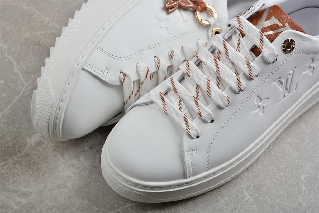 Close-up of the white toe and striped lace detailing