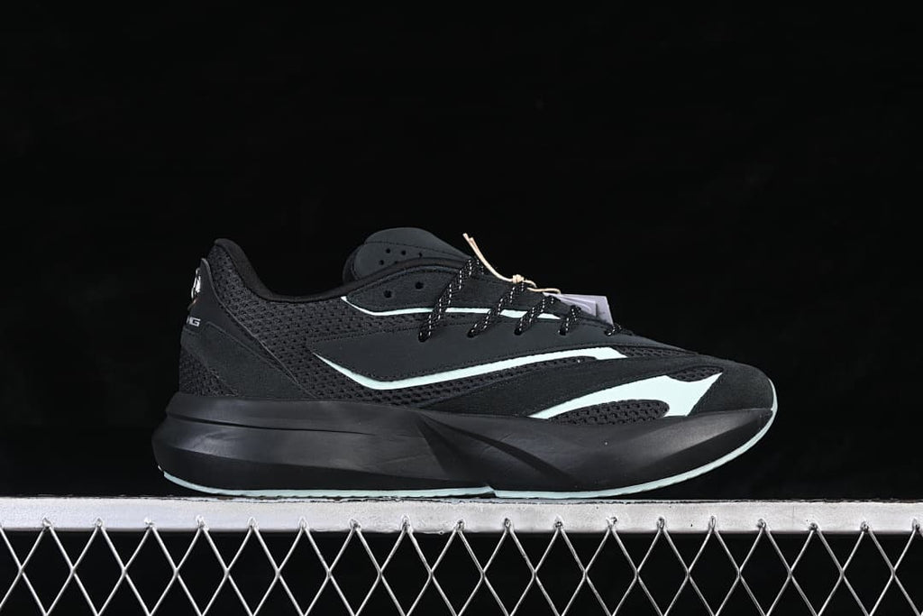 Side view of a black Adidas Lightblaze running shoe with pale mint accents