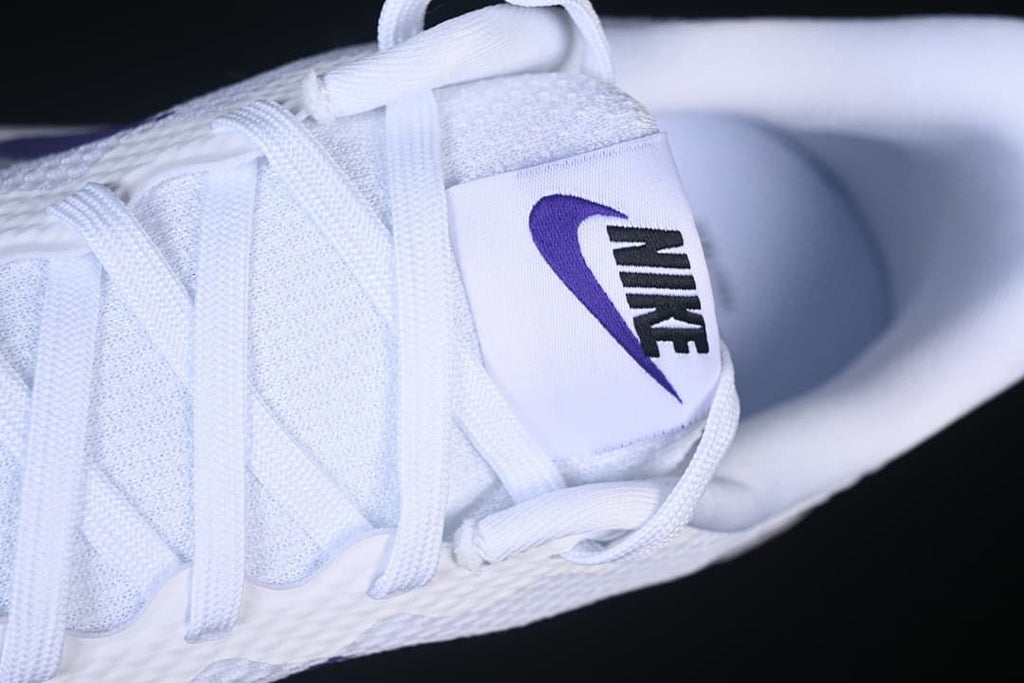 Close-up of the tongue branding and white laces