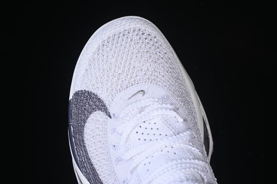 Top view of the knit-look toe and white laces