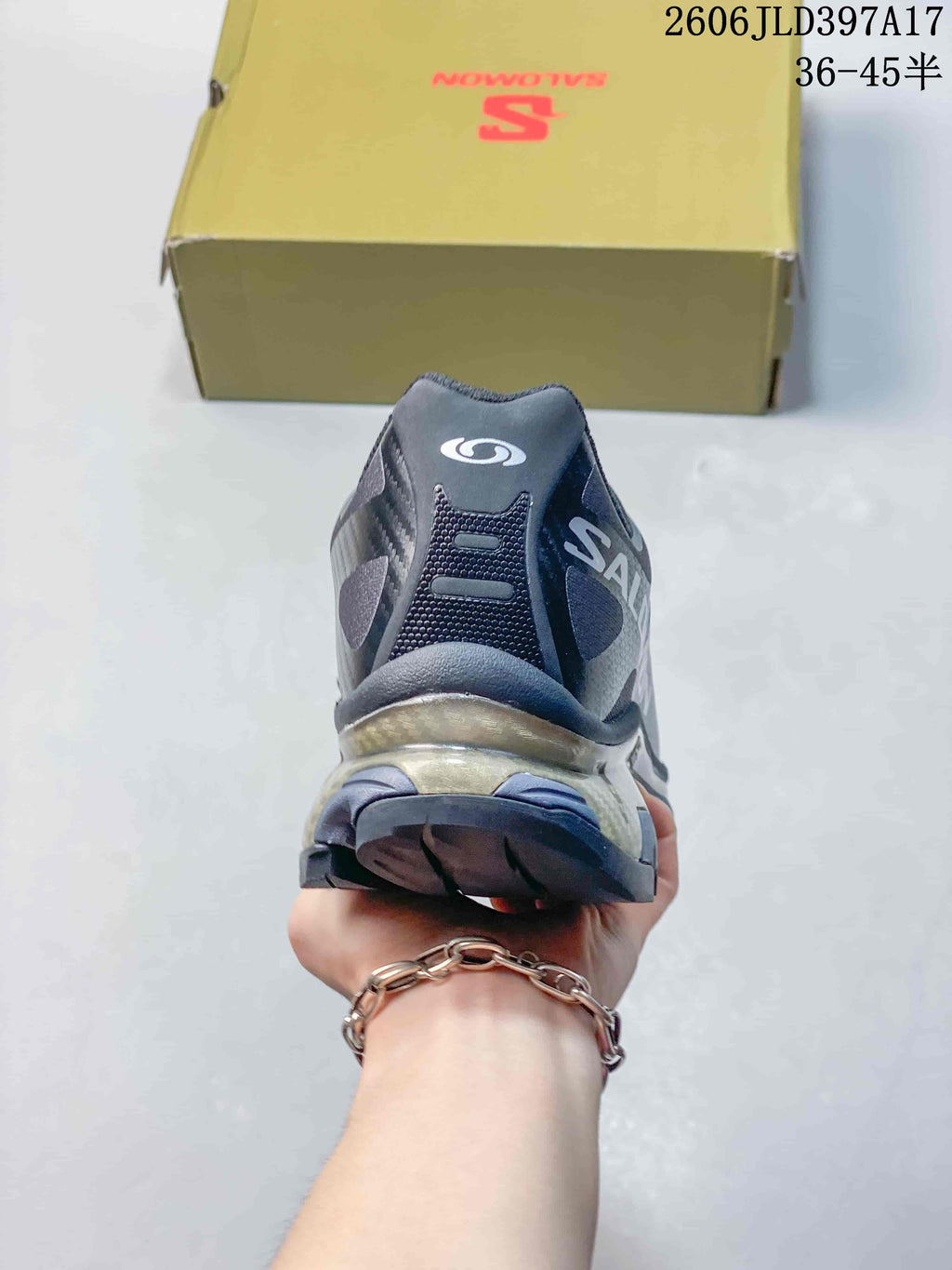 Rear view of a Salomon XT-4 OG sneaker showing the heel and outsole