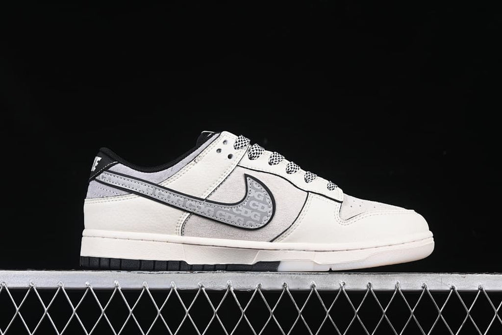 Side profile showing the grey patterned Swoosh and off-white upper
