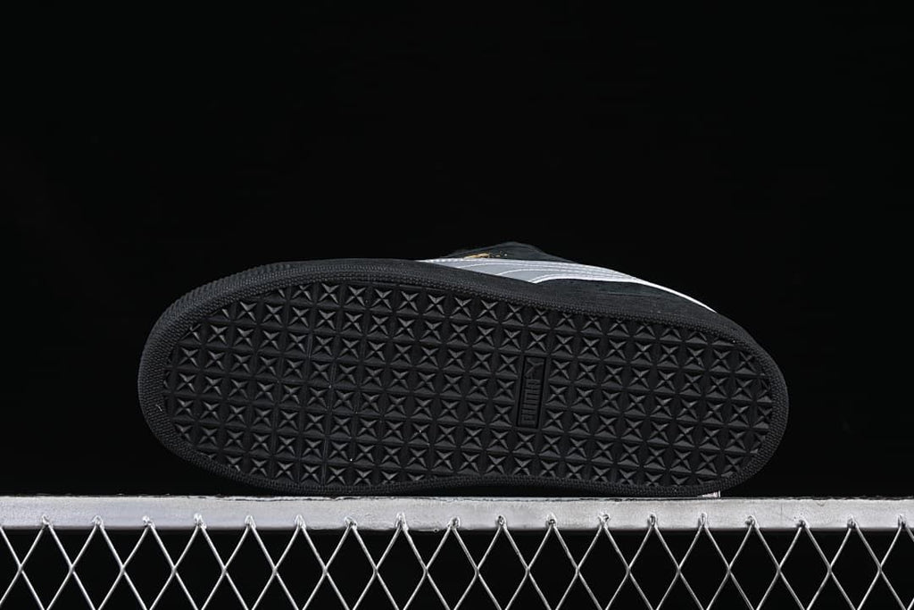 Underside view showing the patterned black outsoles.