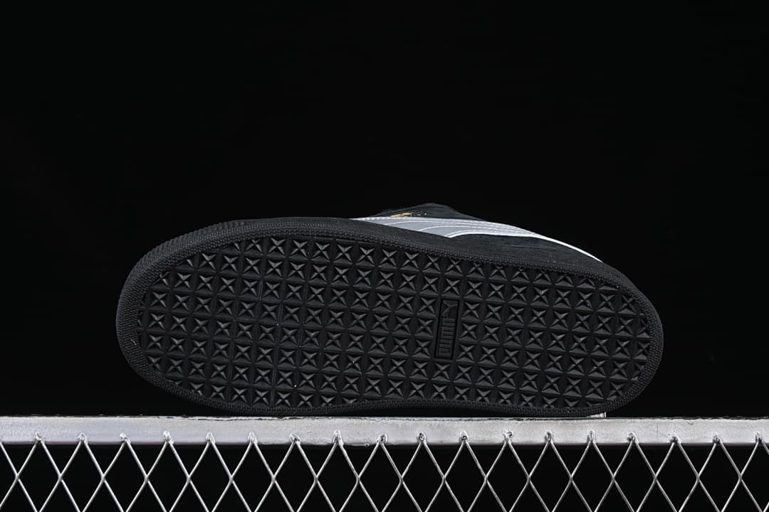 Underside view showing the patterned black outsoles.