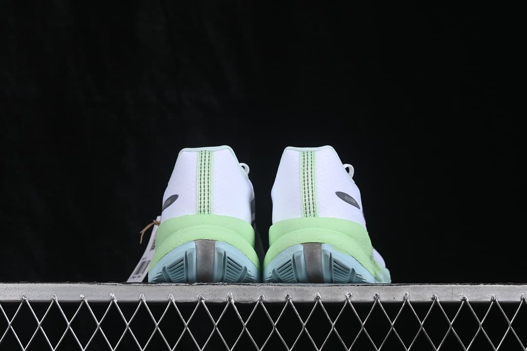 Rear view of both sneakers showing heel and outsole details