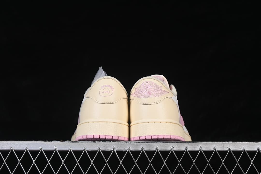Rear view of the pair showing embroidered heel details