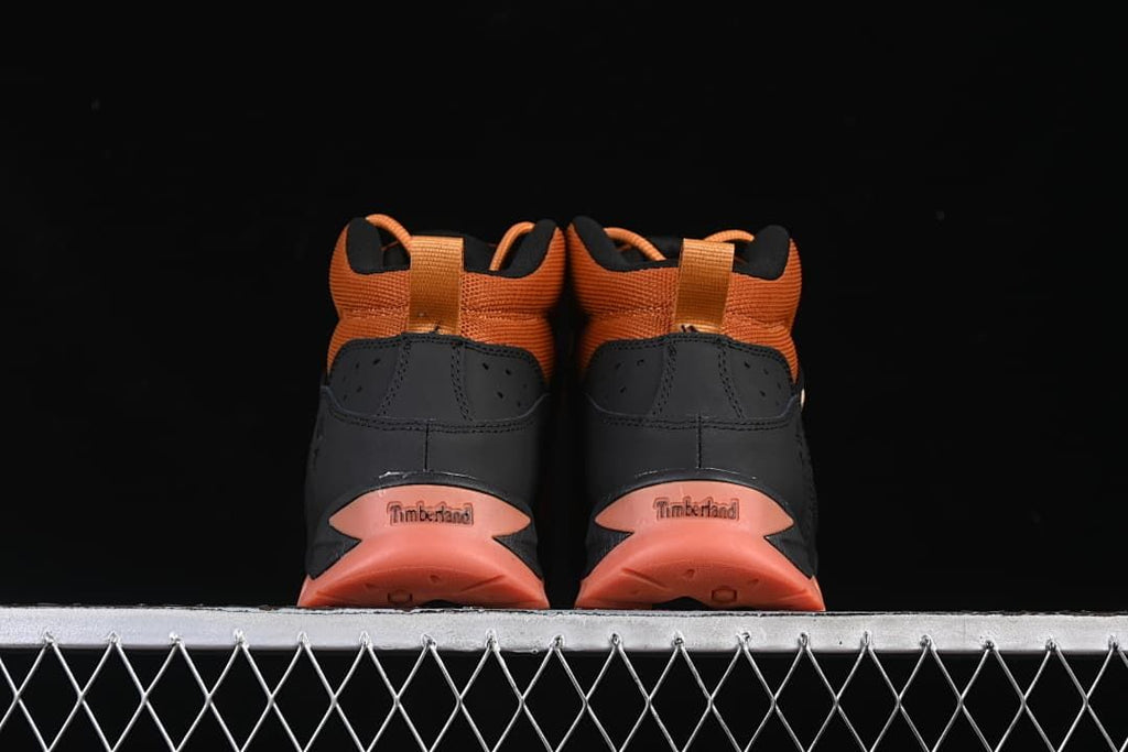 Rear view of the pair showing heel panels and outsole