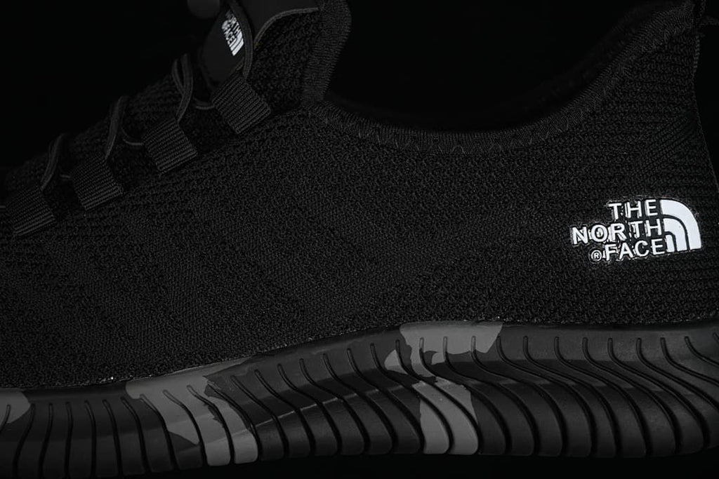 Close-up of the knit-look upper, logo and sculpted sole