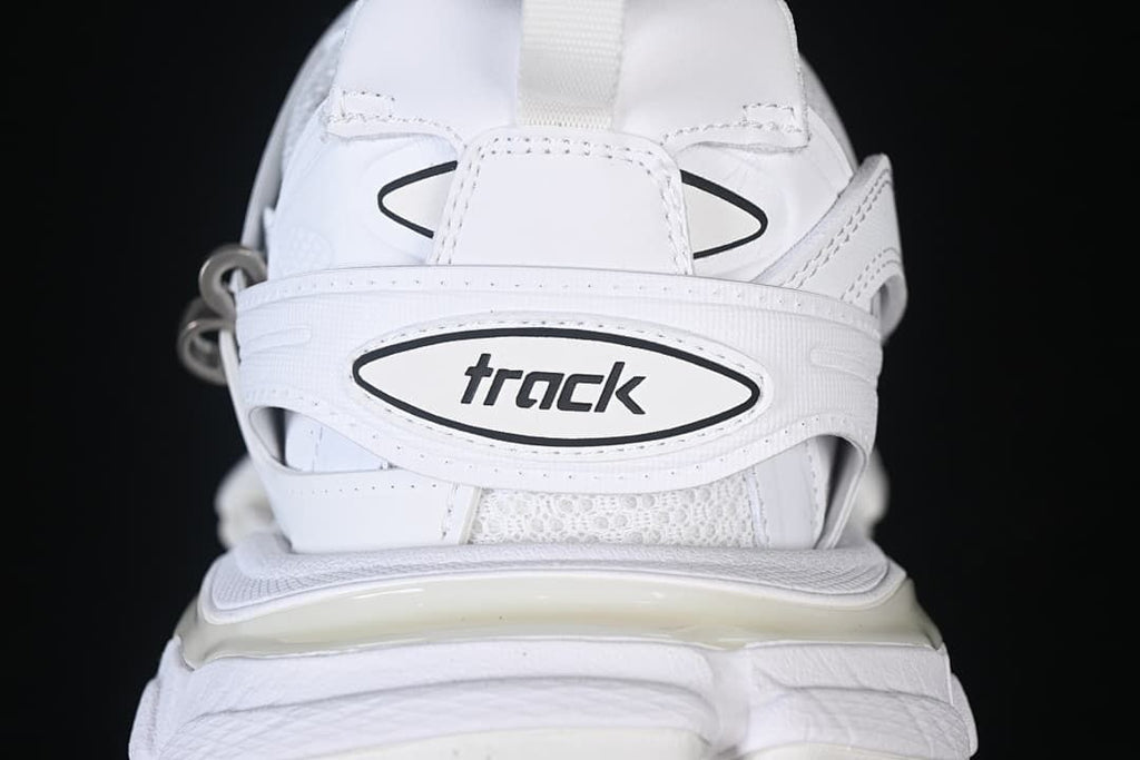 Rear view showing Track branding and layered heel