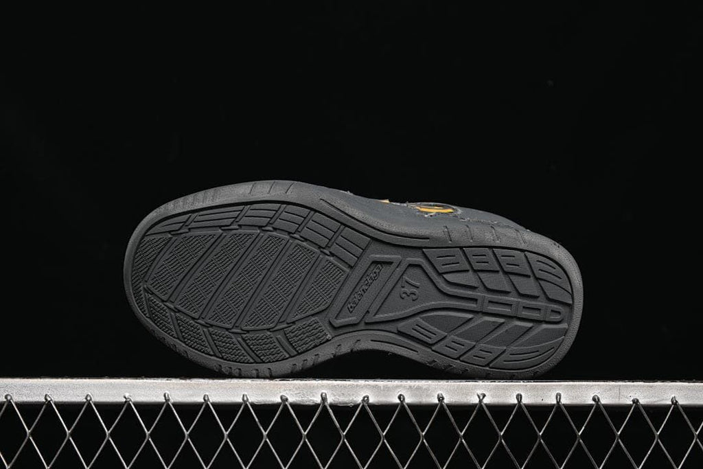 Underside view showing the molded tread pattern and size marking
