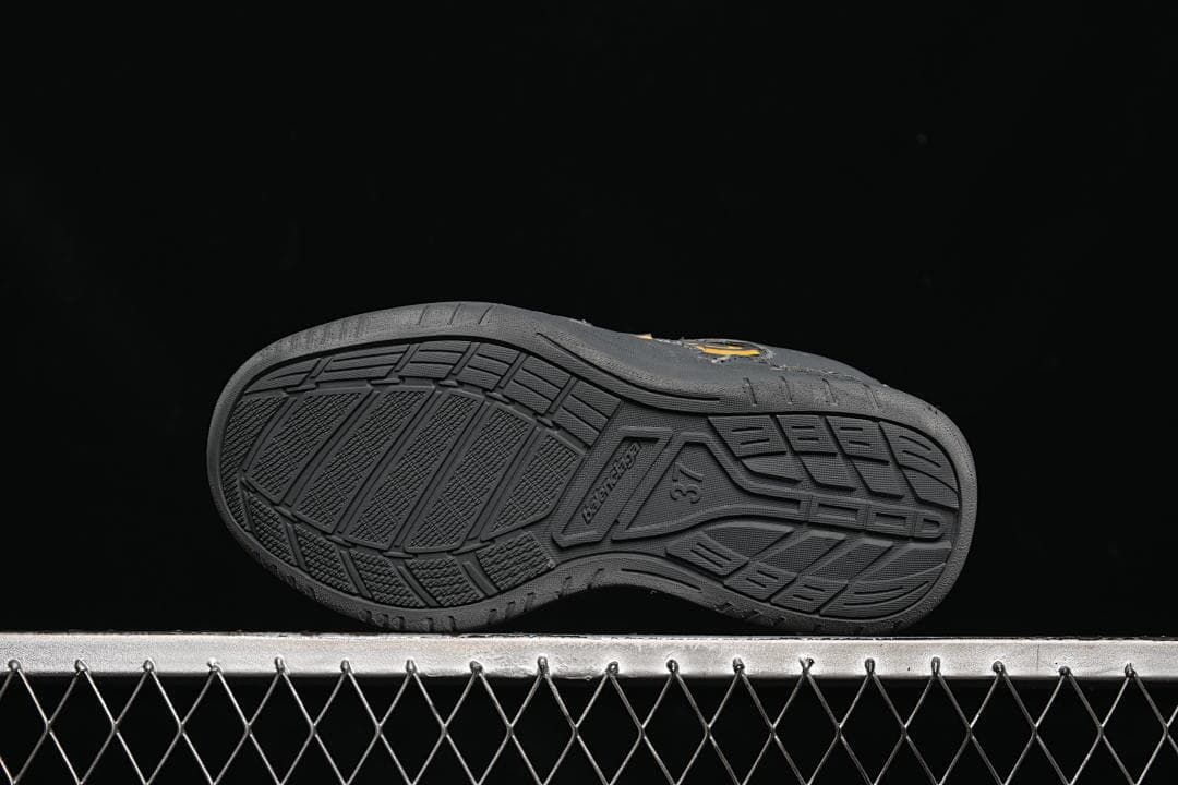 Underside view showing the molded tread pattern and size marking