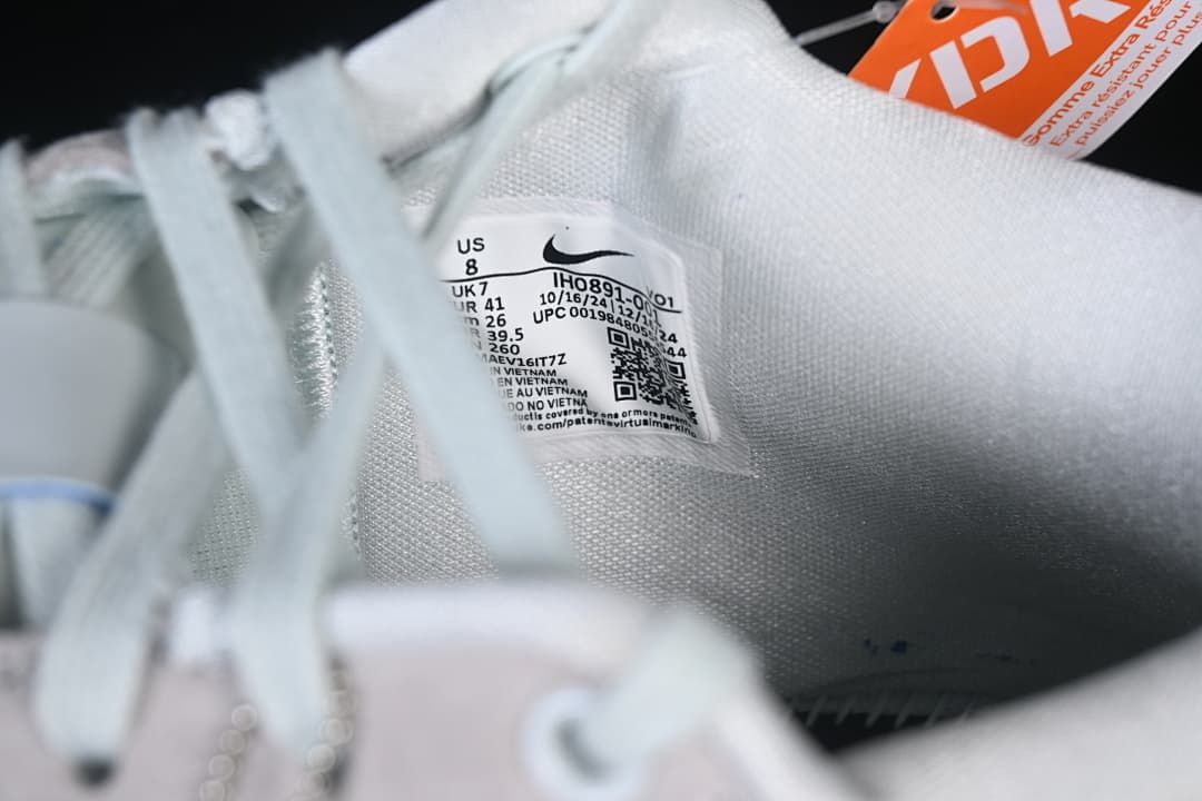 Close-up of the shoe’s interior size and product label