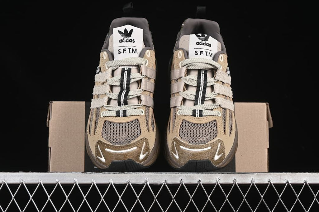 Front view of the pair showing mesh toes and layered laces