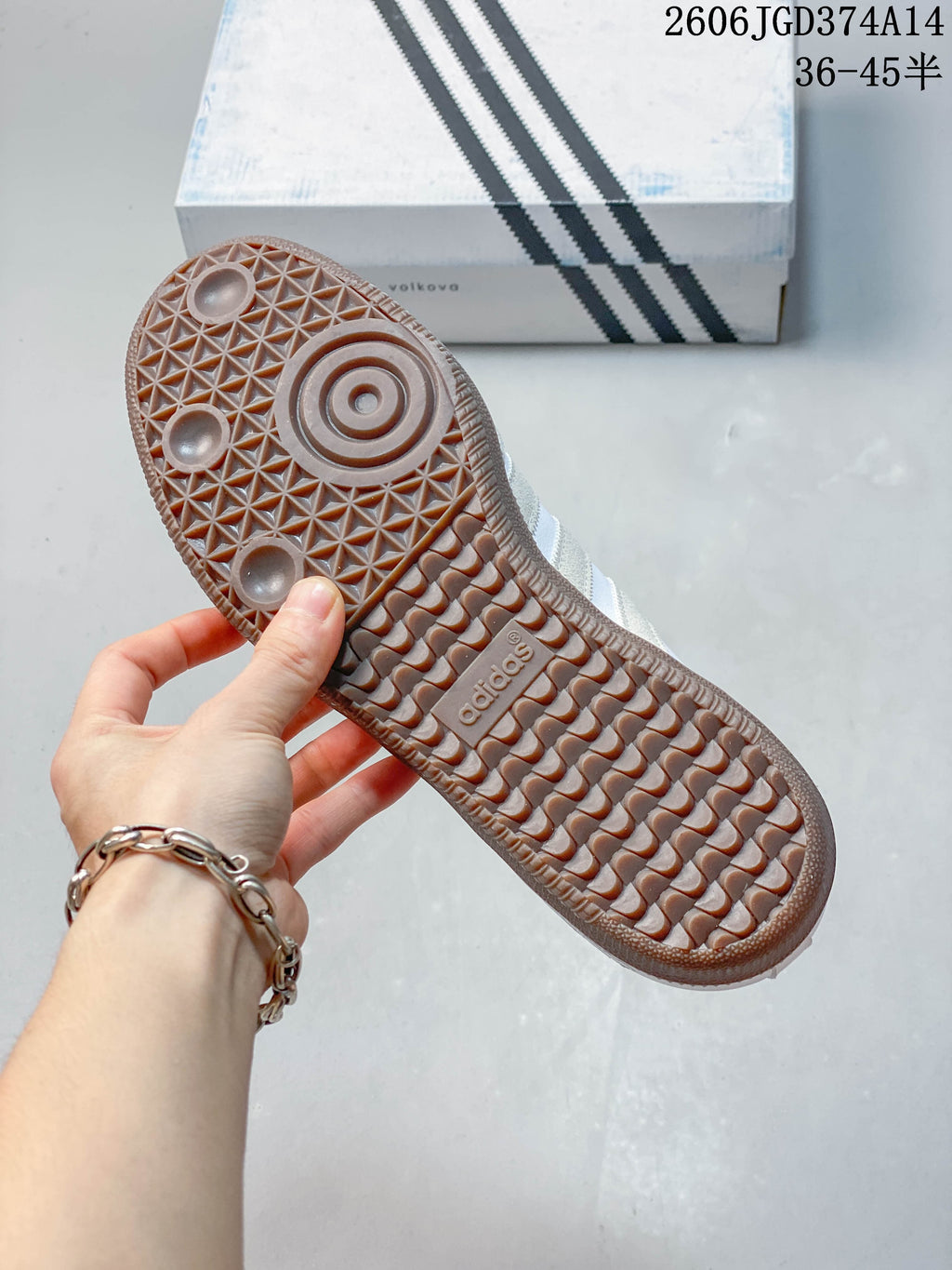 Close-up of the brown-toned patterned outsole on an Adidas Originals sneaker