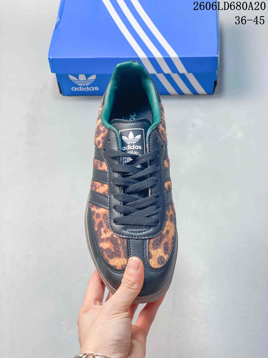 Top view of the leopard-print sneaker with dark laces and contrasting collar lining