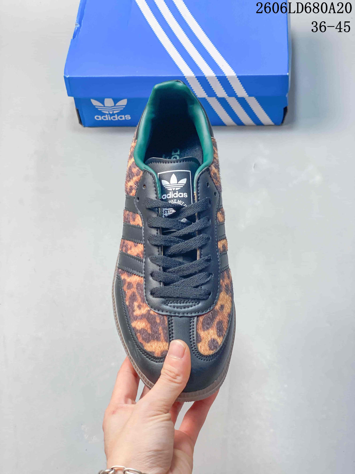 Top view of the leopard-print sneaker with dark laces and contrasting collar lining