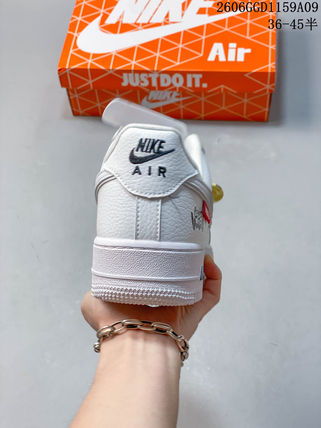 Heel view of a white sneaker with Nike Air branding