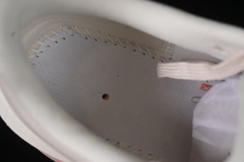 Interior view of the shoe lining and stitching