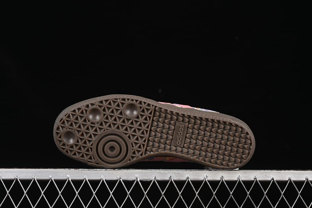 Underside view of the dark brown textured rubber outsole