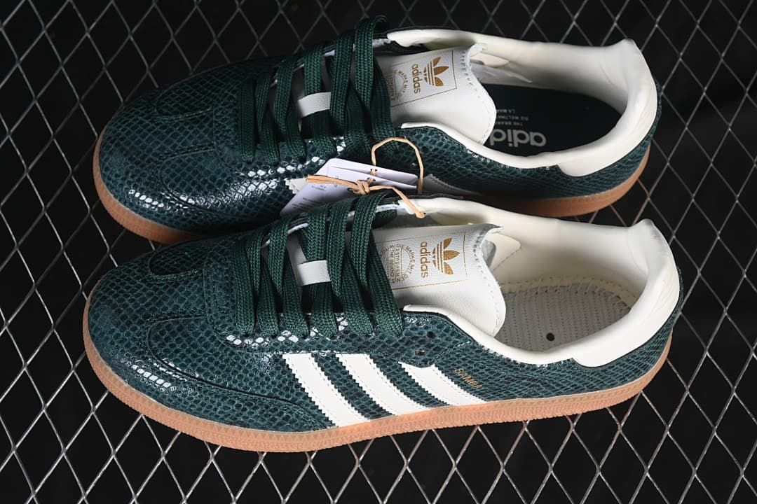 Pair of green adidas Samba OG sneakers with white stripes and gum-colored soles