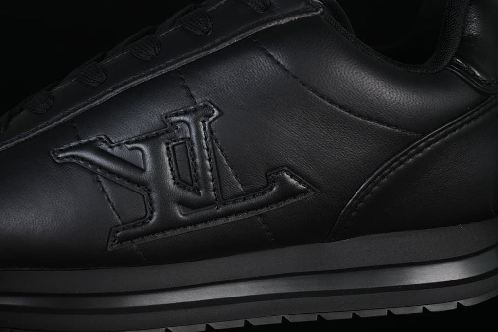 Close-up of the tonal side emblem and layered sole