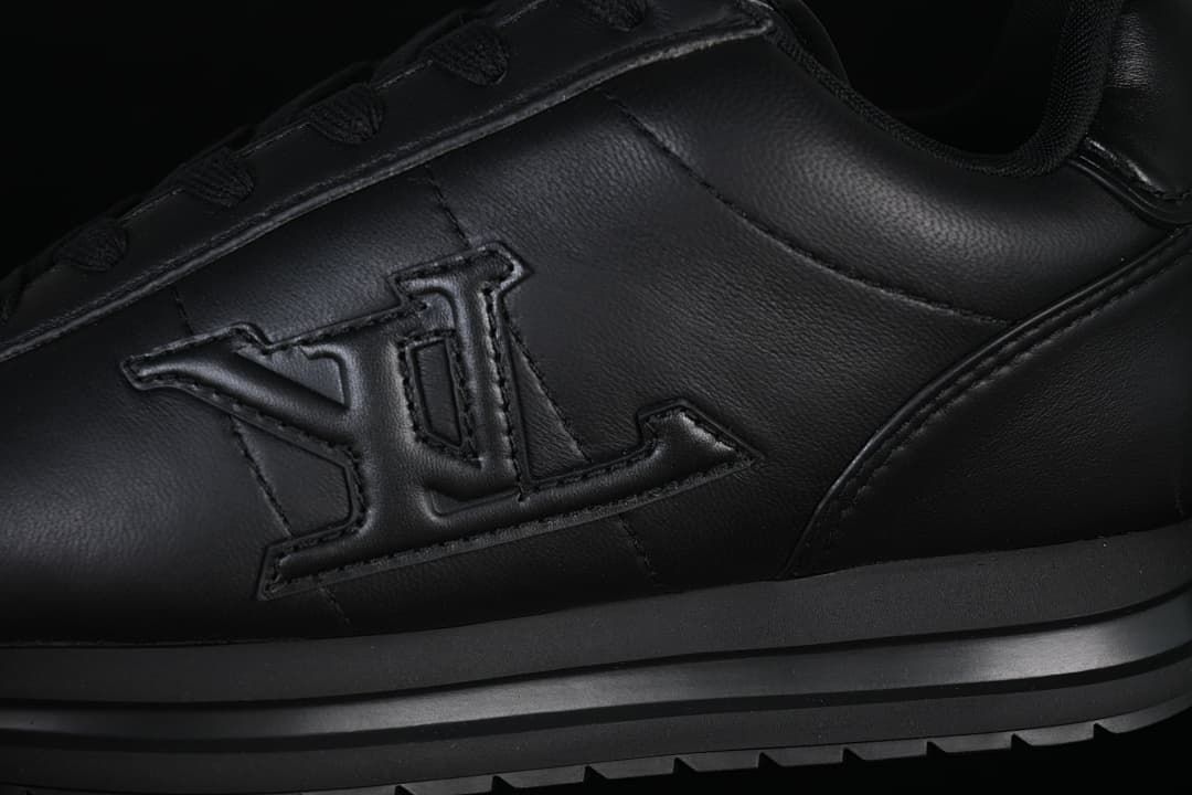 Close-up of the tonal side emblem and layered sole